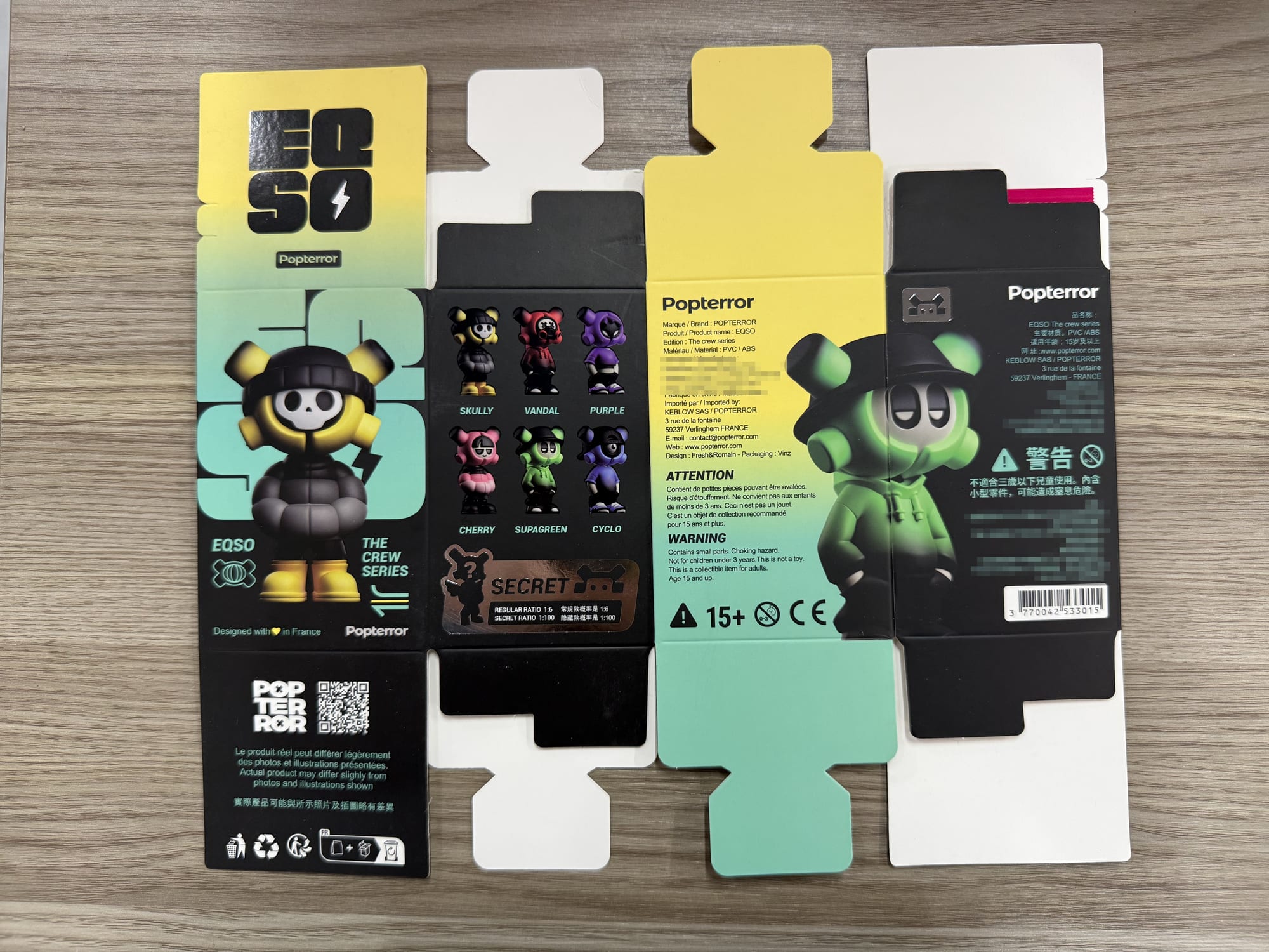 EQSO The Crew blind boxes printed and laid out flat, showing the character list, the odds and the legal notices